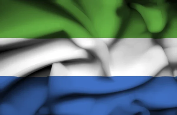 Macha flagą Sierra leone — Zdjęcie stockowe