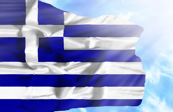 Greece waving flag against blue sky with sunrays — Stock Photo, Image