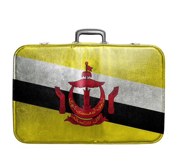 Vintage travel bag with flag of Brunei — Stock Photo, Image