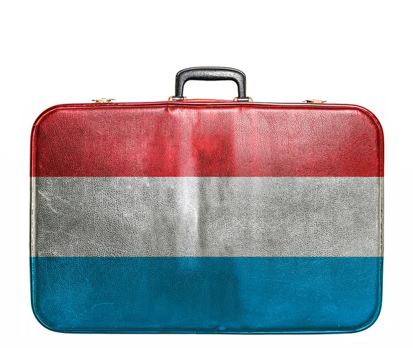 Vintage travel bag with flag of Luxembourg — Stock Photo, Image