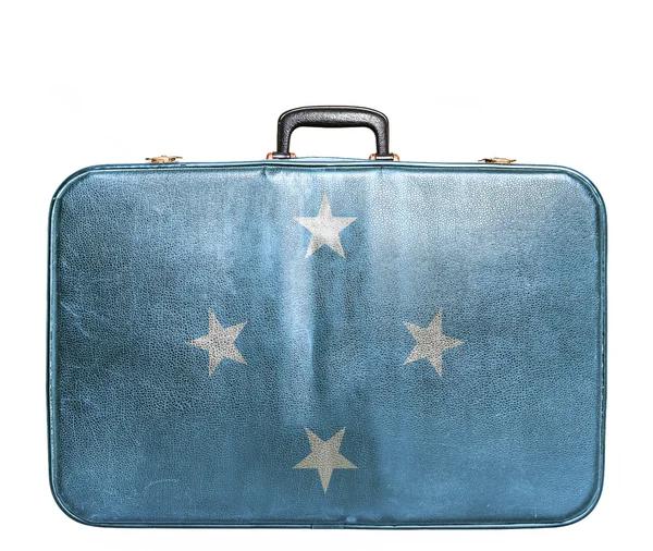 Mikronezya bayrağı ile Vintage seyahat çantası — Stok fotoğraf