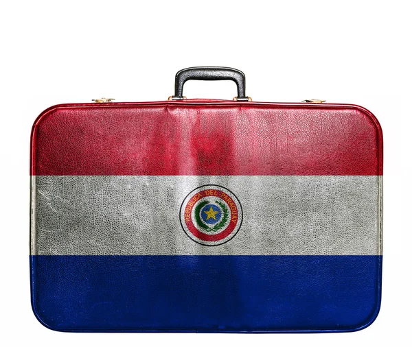 Ročníku cestovní taška s vlajka Paraguaye — Stock fotografie
