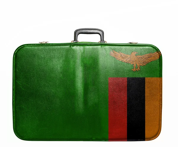 Vintage travel bag with flag of Zambia — Stock Photo, Image