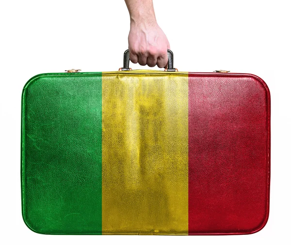 Touristen Hand hält Vintage-Leder Reisetasche mit Flagge der Zeit — Stockfoto