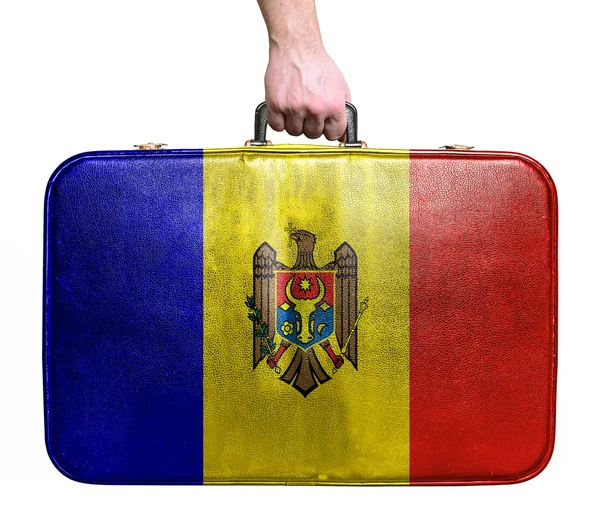 Tourist hand holding vintage leather travel bag with flag of Mol — Stock Photo, Image