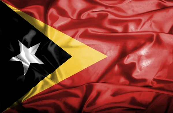 Östtimor viftande flagga — Stockfoto