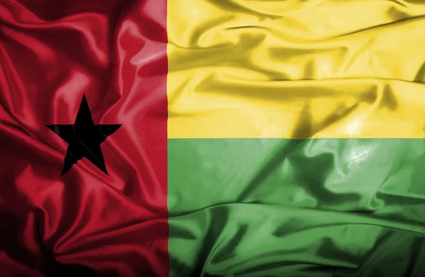 Gwinea bissau macha flagą — Zdjęcie stockowe