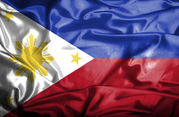 Филиппины, размахивающие флагом — стоковое фото