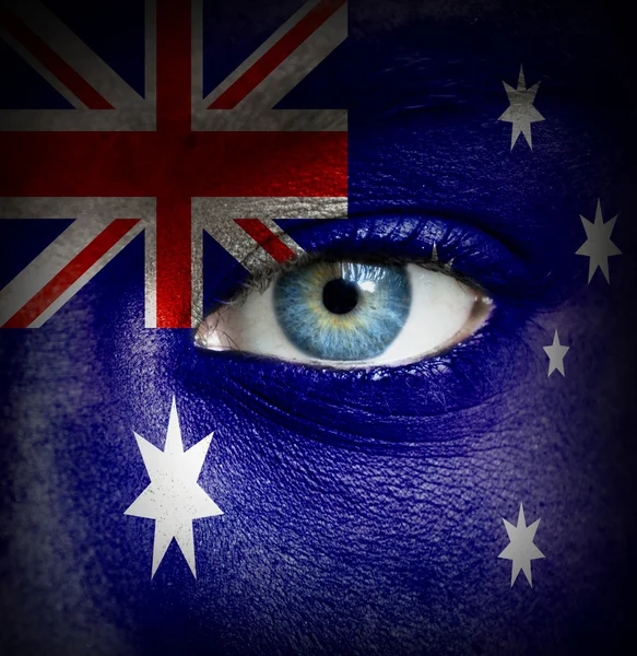 Human face painted with flag of Australia — Stock Photo, Image