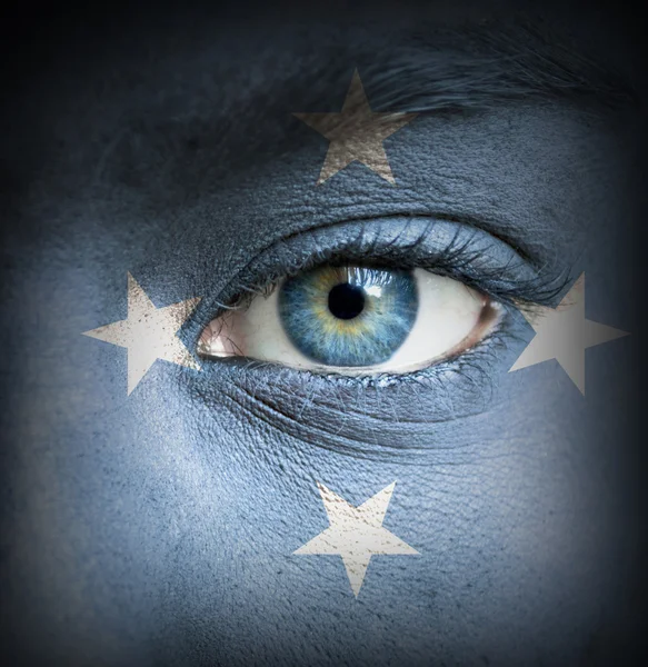 Lidská tvář s Vlajka Mikronésie — Stock fotografie