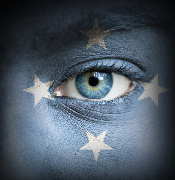 Human face painted with flag of Micronesia