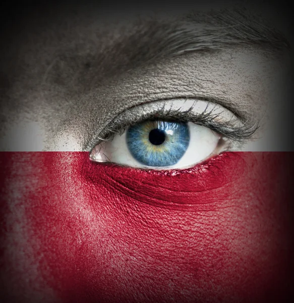 Людське обличчя пофарбовані прапор Польщі — стокове фото
