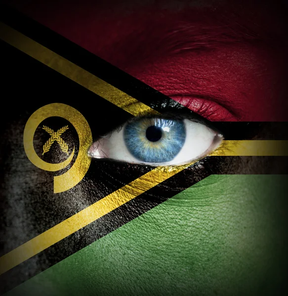 Human face painted with flag of Vanuatu — Stock Photo, Image