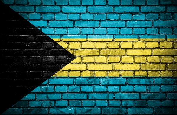 Muro de ladrillo con bandera pintada de Bahamas — Foto de Stock