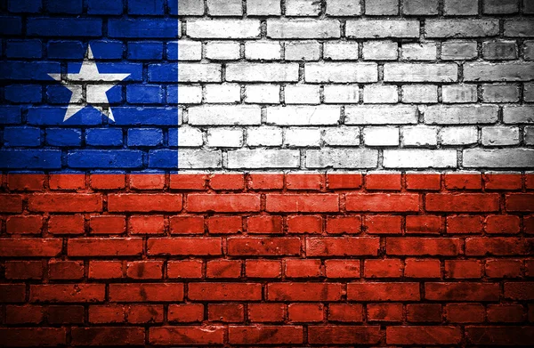 Parede de tijolo com bandeira pintada do Chile — Fotografia de Stock