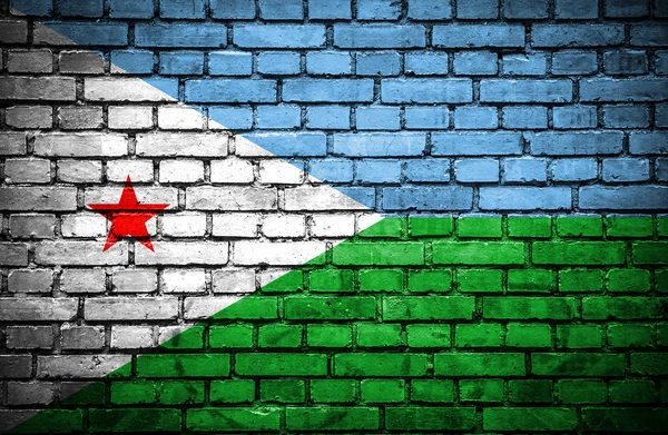 Parede de tijolo com bandeira pintada de Dijbouti — Fotografia de Stock