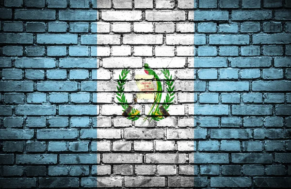 Mur de briques avec drapeau peint du Guatemala — Photo