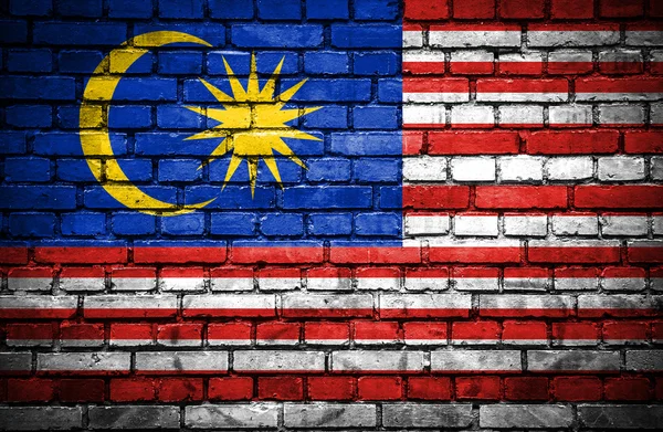 Muro di mattoni con bandiera dipinta della Malesia — Foto Stock