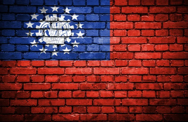 Brick wall with painted flag of Myanmar — Stock Photo, Image