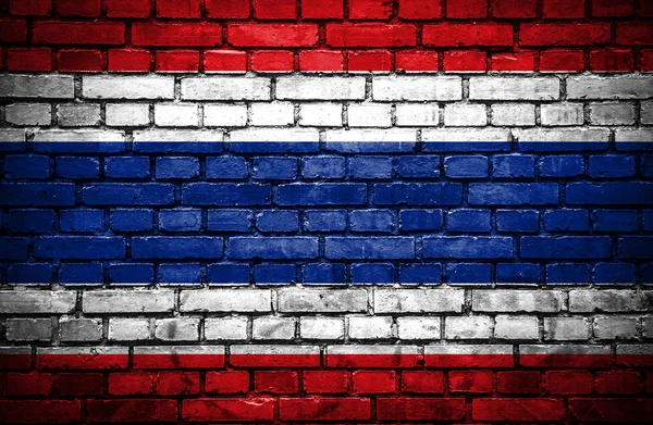 Parede de tijolo com bandeira pintada da Tailândia — Fotografia de Stock
