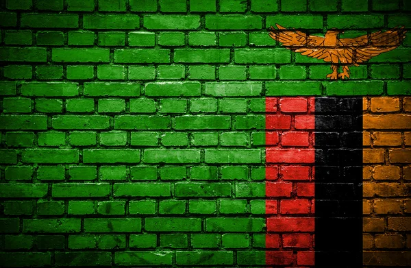 ザンビアの塗られた旗とレンガの壁 — ストック写真