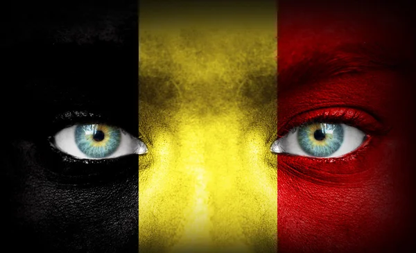 Lidská tvář s vlajkou Belgie — Stock fotografie