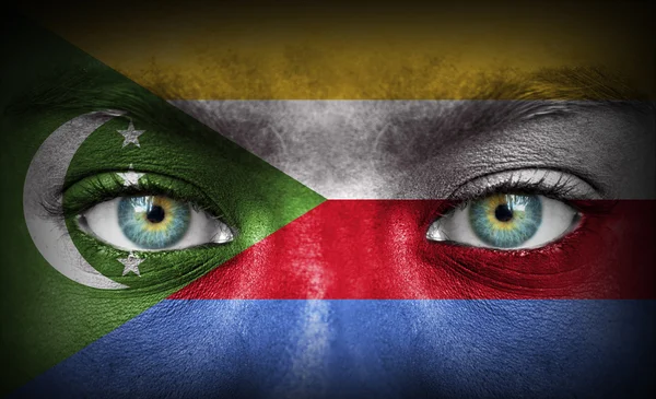 Cara humana pintada con bandera de Comoras — Foto de Stock
