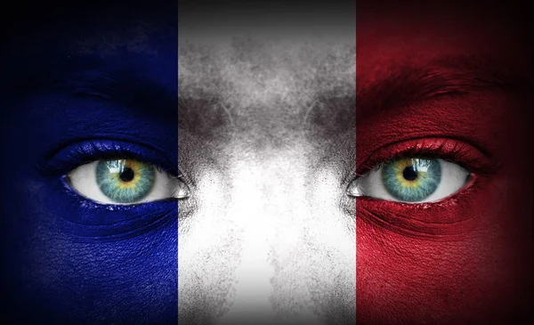 Human face painted with flag of France — Stock Photo, Image