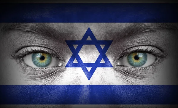 Menschengesicht mit israelischer Flagge bemalt — Stockfoto