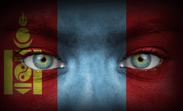 Human face painted with flag of Mongolia — Stock Photo, Image