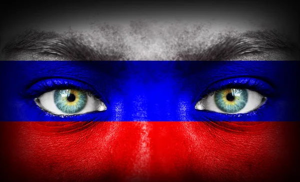 Human face painted with flag of Russia — Stock Photo, Image