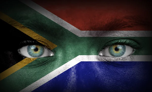 Volto umano dipinto con bandiera del Sudafrica — Foto Stock