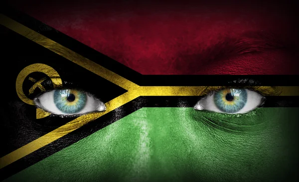 Menschengesicht mit Vanuatu-Fahne bemalt — Stockfoto