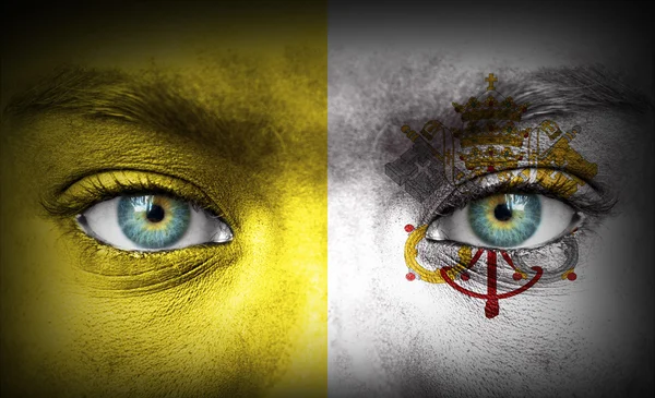 Human face painted with flag of Vatican — Zdjęcie stockowe