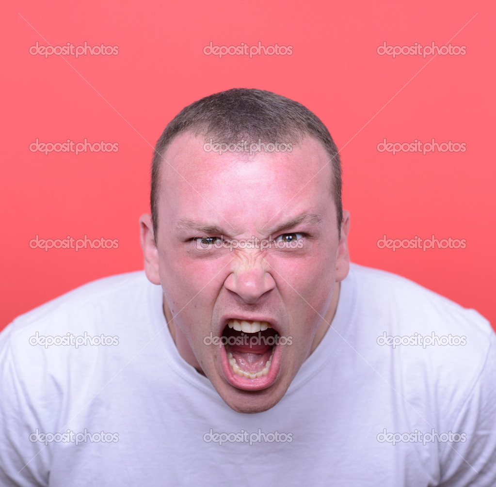 Portrait of angry man screaming against red background Stock Photo by  ©Alexis84 44161433