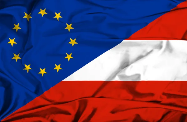Wapperende vlag van Oostenrijk en de eu — Stockfoto