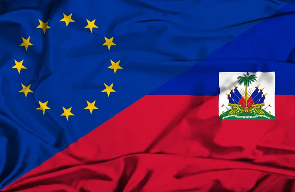 Waving flag of Haiti and EU — Stock Photo, Image