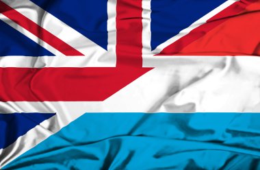 Lüksemburg ve İngiltere bayrağı sallayarak