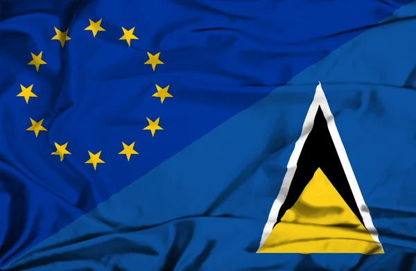 Розмахуючи прапором Сент-Люсії і ЄС — стокове фото
