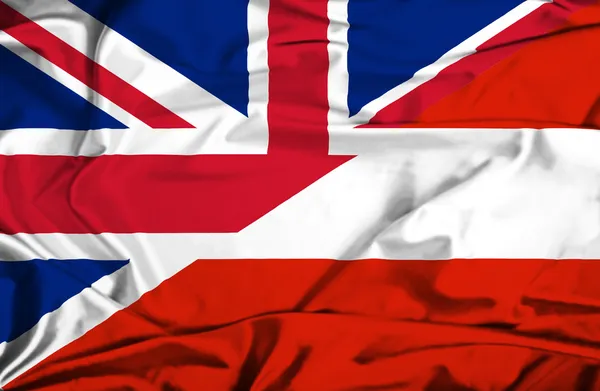 Az Ausztria és az Egyesült Királyság lobogója hullámzó — Stock Fotó