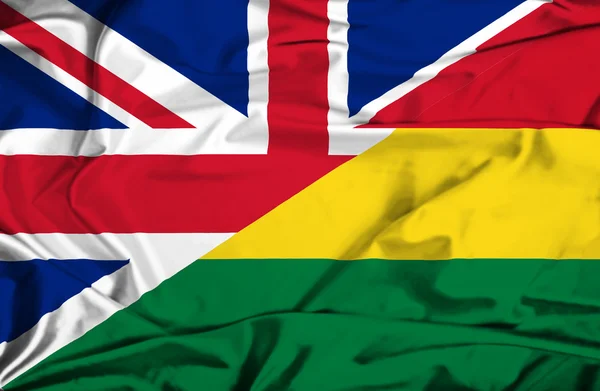 Waving flag of Bolivia and UK — Stock Photo, Image