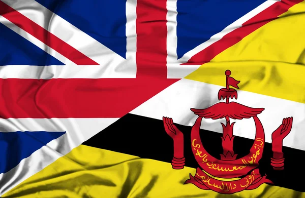 Waving flag of Brunei and UK — Stock Photo, Image