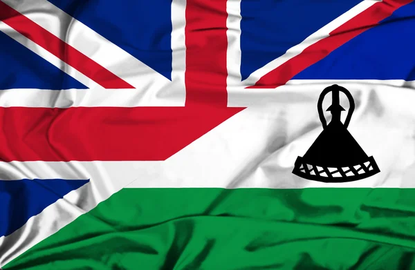 Bandeira acenando de Lesoto e Reino Unido — Fotografia de Stock