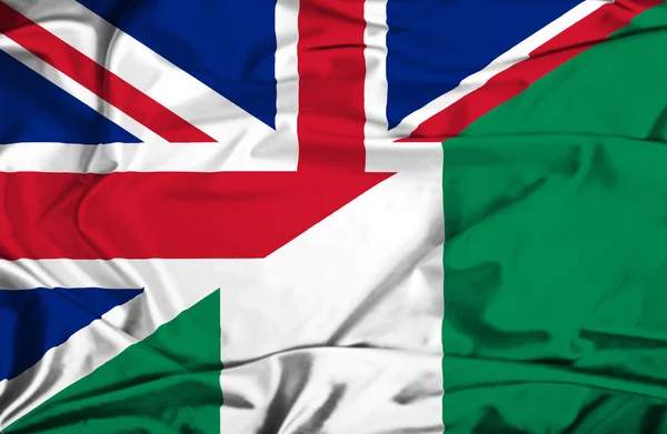 Flagge Nigerias und Großbritanniens schwenken — Stockfoto