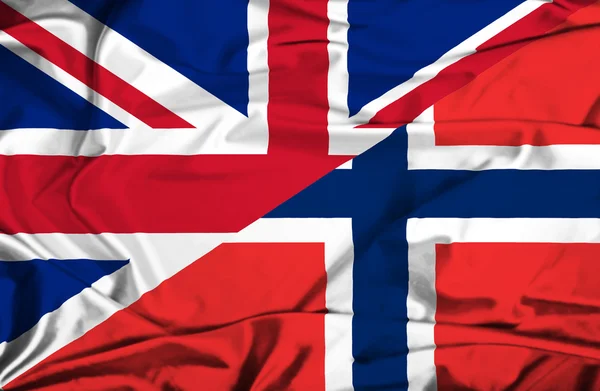 Bandeira ondulada da Noruega e do Reino Unido — Fotografia de Stock