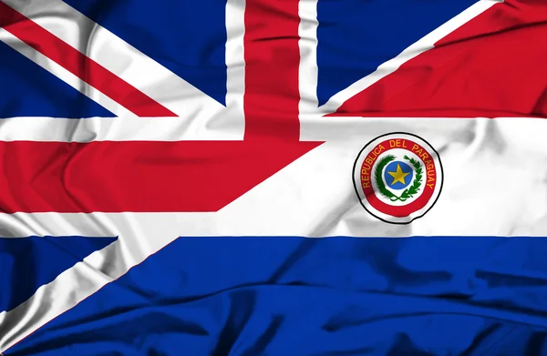 パラグアイと英国の旗を振る — ストック写真
