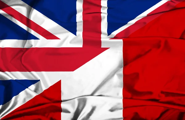 Waving flag of Peru and UK — Stock Photo, Image