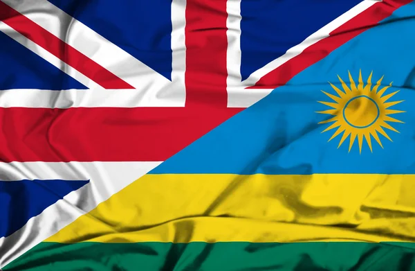 Flagge Ruandas und Großbritanniens schwenken — Stockfoto