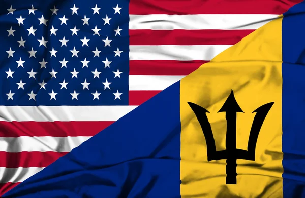 Flagge von Barbados und den USA schwenken — Stockfoto