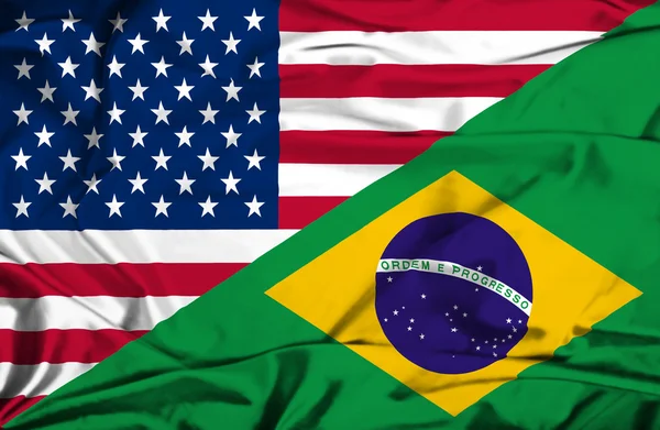 https://st.depositphotos.com/1020341/4420/i/450/depositphotos_44202731-stock-photo-waving-flag-of-brazil-and.jpg